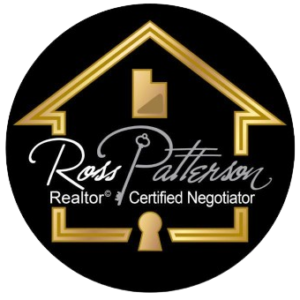 Ross Patterson Realtor, Certified Negotiator inside a gold house